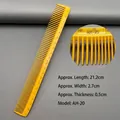 Detailed view of yellow hair cutting comb with precise 21cm scale markings and model AH-20 - AH-20