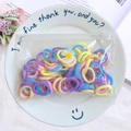 Colorful macaron hair ties set in a transparent bag with white daisy flower patterns - 50Pcs/Bag / Macaron Color