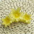 Translucent yellow plumeria hair claw clip in a vibrant candy color flower design - Triple Daisy [Yellow]