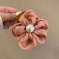 Elegant dusty pink satin flower hair claw clip with a large white pearl center detail - Orange Flower Claw Clip