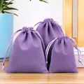 Three purple velvet drawstring pouches in small, medium, and large sizes for jewelry - Light Purple