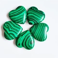 Five heart-shaped natural malachite stones with unique dark green and black stripe patterns - Malachite (Synthetic)