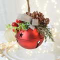 Christmas decoration featuring a large red metal bell with pine cones and silver bow - Pine Cone Decoration Style / Red Bell with Pine Cone