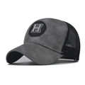 Gray and black mesh trucker hat with 'H' patch shown from a 45-degree angle view - Adjustable / Gray