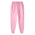 Pink fleece joggers with drawstring elastic waist and ribbed cuffs on white background - S / Pink