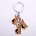 Fashionable keychain with three orange and black enamel Yorkshire Terrier dog pendants - Yorkie Triple