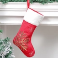 Red Christmas stocking with gold sequin snowflake and white faux fur trim on fireplace - Red Snowflake Style