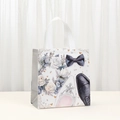 White non-woven wedding gift bag featuring elegant floral and tuxedo prints with handles - 5047-4 Rose Wreath & Shoes Print