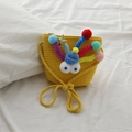 Cute yellow woven straw cross-body bag for girls with colorful pompoms and star charms - Yellow