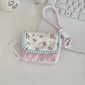 Detailed view of pink floral cotton camera case with quilted texture and wrist strap - Floral Pink + Light Pink Heart