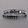 Bracciale regolabile in ematite con perline esagonali nere e cordino intrecciato - Esagono