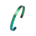 Macro shot of minimalist iridescent rainbow PVD finish on a stainless steel cuff bracelet - 4mm / Stripes / Iridescent