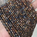 Faceted natural gemstone beads in mixed colors like navy blue, ochre, and grey for DIY - Pietersite 3mm