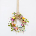 Easter wreath with pastel eggs, faux flowers, and a burlap bow for spring party decor - Easter Egg & Burgundy Berry Wreath with Linen Bow