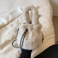 Chic beige faux fur bucket bag with drawstring closure and plush top handle - White