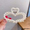 Elegant 8cm heart-shaped hair claw clip made of white pearls with silver spring mechanism - Heart Pearl