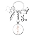Cute medical themed keychain featuring silver doctor charms and human skeleton glass cabochon - Anatomical Skeleton