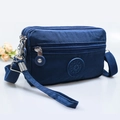 Sac bandoulière en nylon bleu pour téléphone avec plusieurs compartiments zippés - Bleu Royal