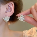 Exquisite silver flower pearl earrings with branch design shown on ear and in hand - 37# Silver Earring Post - Silver