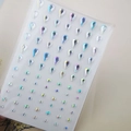 Macro detail of AB iridescent teardrop and round self-adhesive face jewel stickers - Teardrop AB Rhinestone (Single Pack)