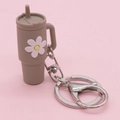 Miniature taupe tumbler keychain with white daisy floral detail and silver D-ring - Grey Flower Cup Keychain