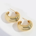 Close-up of golden chunky C-shaped hoop earrings with a polished mirror finish - C-Shaped Chunky Hoop / Gold Yellow