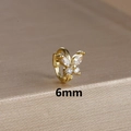 Macro view of 6mm golden butterfly earring with clear zircons on gold textured stand - 6mm / Gold-White
