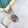 Handmade gold wire-wrapped tree of life necklace with a purple teardrop amethyst crystal - Amethyst Gold
