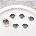 Cartoon green monster nail charms for Halloween decorations on pink false nails - #6 Braid Clown