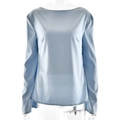 Detail of light blue satin long sleeve top with elegant flare sleeves on a mannequin - M / Blue