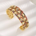 Luxuriöser goldener Armreif mit bunten Zirkonia-Steinen für Damen im Pavé-Stil - Mehrfarbiger Zirkonia Gold Armreif