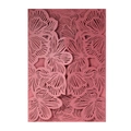 Detail of laser-cut rose pink invitation card with intricate pearlescent floral hollow patterns - Dark Red