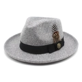 Detail of grey fedora with black grosgrain band, gold emblem, and spotted feather accent - M (56-58cm) / Light Heather Grey