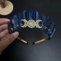 Detailed view of raw blue iridescent crystals and golden moon symbol on a metal headband - Dark Blue + Gold Wire Gold Headband Gold Moon