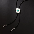 Western bolo tie featuring white daisy pendant with turquoise stone and braided black cord - Turquoise Flower Necklace