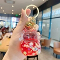 Red lucky cat liquid quicksand keychain with gold bell and sparkling star sequins - Lucky Cat Flash - Red / Individual Packaging