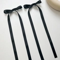 Pair of elegant black satin ribbon bow hair clips with long streamers for ballet style - Black (1 Pair)