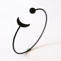 Adjustable matte black sun and moon open cuff bracelet for women in minimalist design - Star Moon / Black