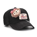 Detail of denim baseball cap with plush bear ornament and vintage Rucru embroidery patch - One Size / Black