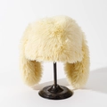 Detail of soft cream faux fur material on the warm plush winter bucket hat with rabbit ears - M (56-58cm) / Yellow