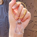 Llavero dorado con colgante de cápsula transparente en forma de gato para pelo de gato - Colgante Clásico - Gato Siamés
