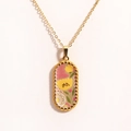 Macro view of oval gold-plated necklace pendant with fabric floral embroidery detail - Yellow Floral Pink Check (Style 4)