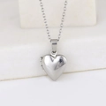 Polished silver heart locket necklace made of stainless steel on a white display block - Smooth Heart 13*15/Steel