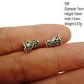Macro shot of antique silver alloy beads with detailed engraving and dimensions - Style 5