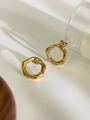 Minimalist irregular hexagonal hoop earrings in polished gold finish with lava texture - Irregular Circle Earrings / Gold (Earrings)