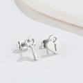 Asymmetric stainless steel heart lock and key stud earrings with polished silver finish - Steel