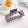 Matte purple rectangular hollow hair claw clip with frosted texture on a white table - 10.5cm / Taro Purple