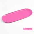 Detail view of oval stainless steel storage tray in polished rose red metallic finish - Rose Red