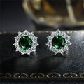 Elegant emerald green sunflower earrings with white cubic zirconia in silver setting - Green