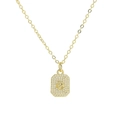 Detailed close-up of a gold-plated necklace featuring a zircon-inlaid letter P pendant - Necklace P